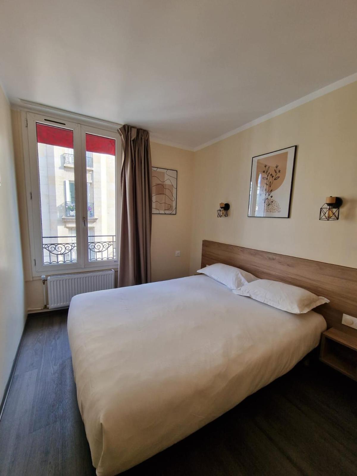 Hôtel D'Anjou Levallois-Perret Exterior foto